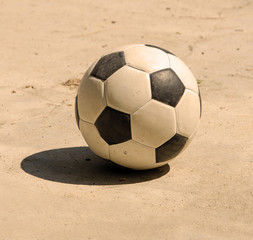 soccer football on cement floor