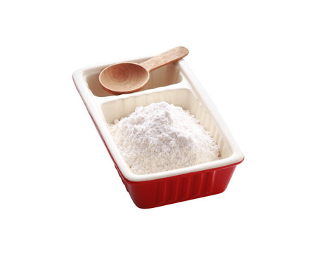 white flour in ceramic cup and spoon on white background