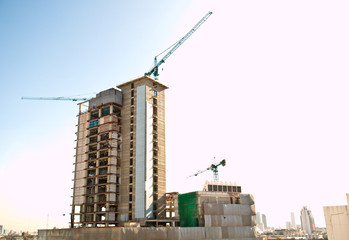 Fototapeta na wymiar Building construction site in urban