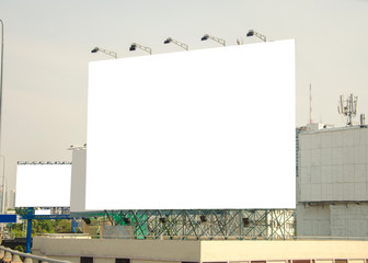 large blank billboard with city view background