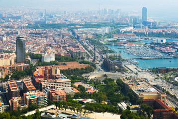 Fototapeta premium view of seaside part of Barcelona from helicopter