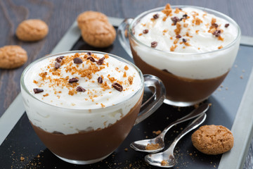 dessert with chocolate, cream and amaretti in cups
