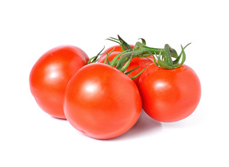 bunch of red tomatoes isolated on a white background
