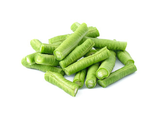 cut small and slender green beans on  white background