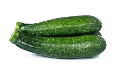 fresh green zucchini isolated on white background