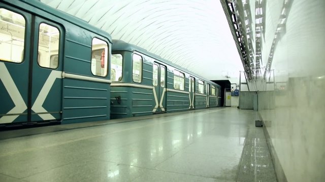 Trains And Passengers Traffic At Subway Station