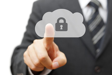 Safe cloud and online remote data. businessman pressing cloud ic