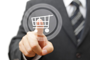 Online shopping  concept with businessman touching virtual shopp