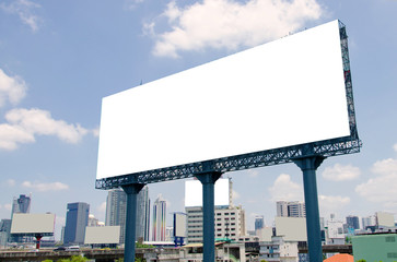 large blank billboard on road with city view background - obrazy, fototapety, plakaty
