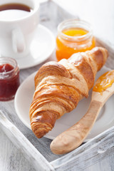 fresh croissants with jam for breakfast