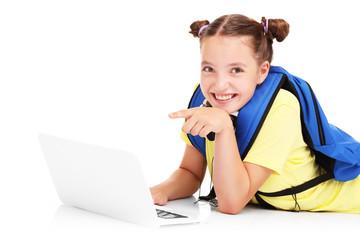 Schoolgirl using laptop