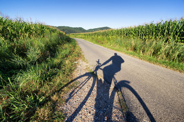Fototapeta na wymiar with bike on country road