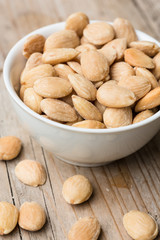 Toasted and salted almonds in a bowl
