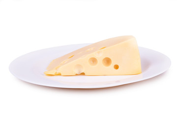 piece of cheese on a white plate