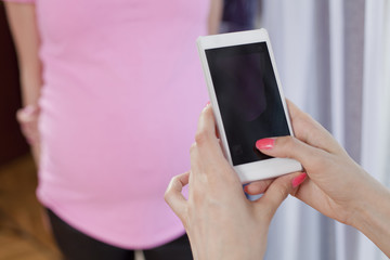 photographing pregnant women mobile phone