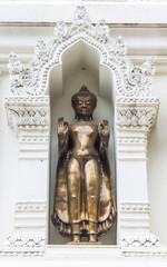 Buddha statue in an Ancient Pagoda, Lamphun Province, Thailand