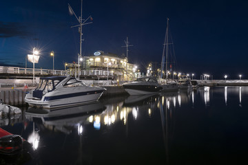 Fototapeta na wymiar Yacht boats in Marina Sopot town at night, Poland