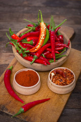 Red chilli peppers and spices on the table