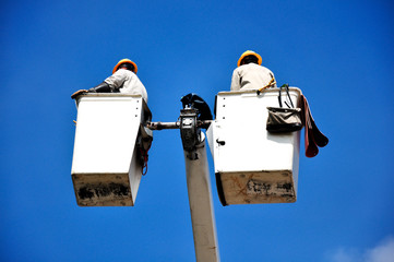 Worker in bucket
