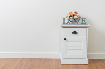 Love sign on bedside table