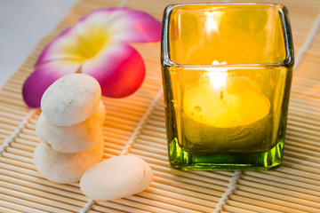 Candle and stones