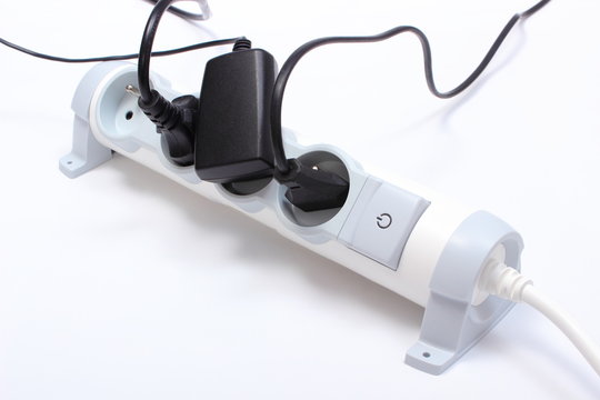Electrical cords connected to power strip, 