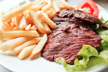 juicy steak beef meat with tomato