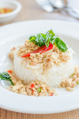 Spicy fried chicken with basil and rice