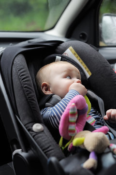 Little Baby Boy In Car Seat