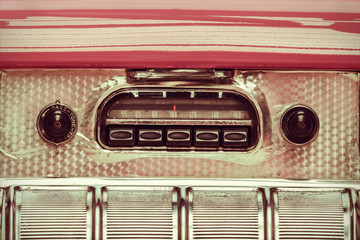 Obraz premium Retro styled image of an old car radio