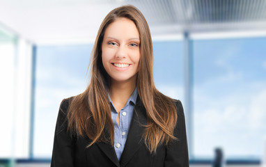 Smiling businesswoman in her office