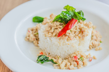 Spicy fried chicken with basil and rice