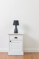 Lamp on bedside table