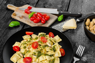 Home made ravioli with basil pesto