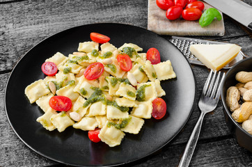 Home made ravioli with basil pesto