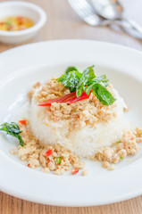Spicy fried chicken with basil and rice