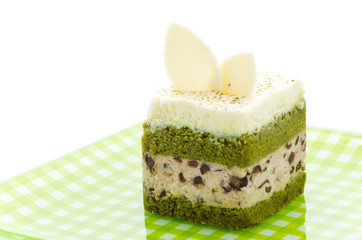 Matcha green tea cake isolated on white background