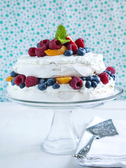 Meringue cake with fresh berries. Pavlova cake