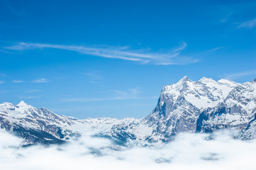Fototapeta na wymiar Snow Mountain Range Landscape with Blue Sky from Jungfrau Region