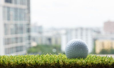 Golf ball on green grass