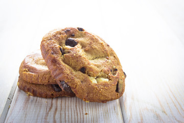 Close up chocolate chip cookies on wood