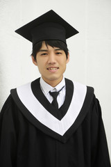 A graduate smiling, isolated