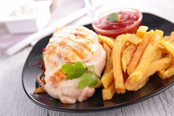 chicken breast and fries