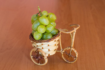 small basket with grapes