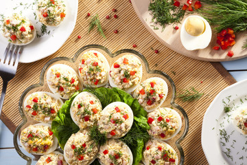 stuffed eggs with ham, red pepper and dill