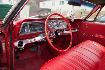 red interior american car from sixities