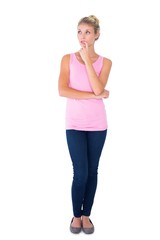 Fototapeta premium Pretty young blonde in pink thinking