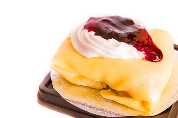 Crape cake with sweet blueberry sauce