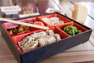 Boxing with Japanese food.