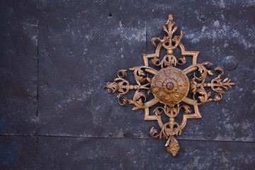 Ancient decorative ornament on metal plate background